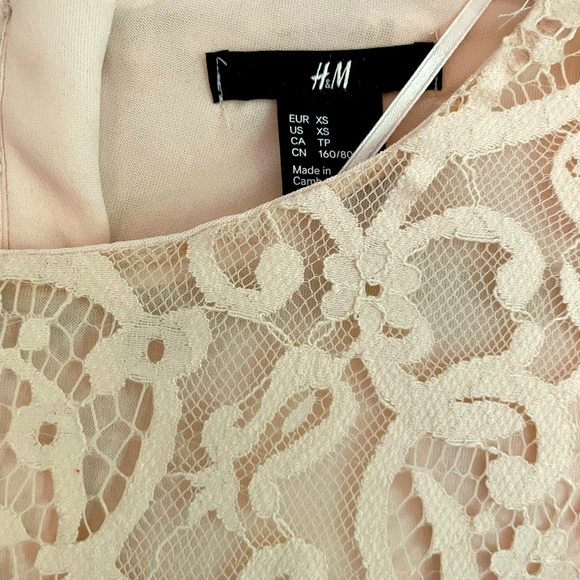 H&M lace rose cream dress. Size XS. Clean, no stains or damage. Worn once. - Picture 2 of 3